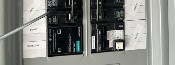 Whole-home surge protective device (Siemens SPD) installed in an electrical panel by Fogle & Sons Electric