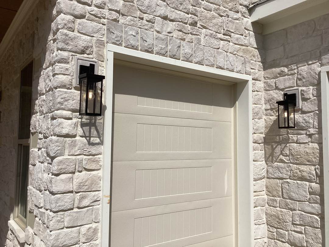 Exterior coach lighting installed by Fogle & Sons Electric on a Elgin, SC home